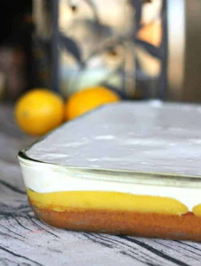 Lemon Burst Poke Cake in a pan