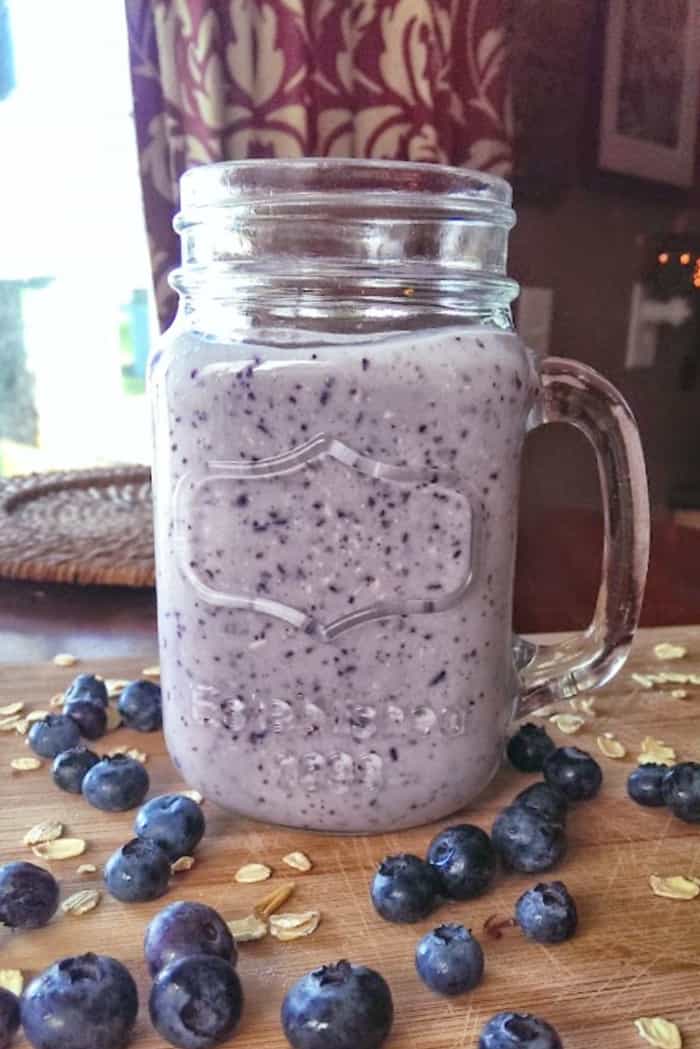 mug of Blueberry Oatmeal Protein Smoothie (Greek Yogurt}