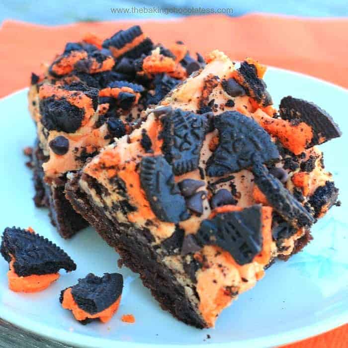 2 orange buttercream iced brownies with oreos