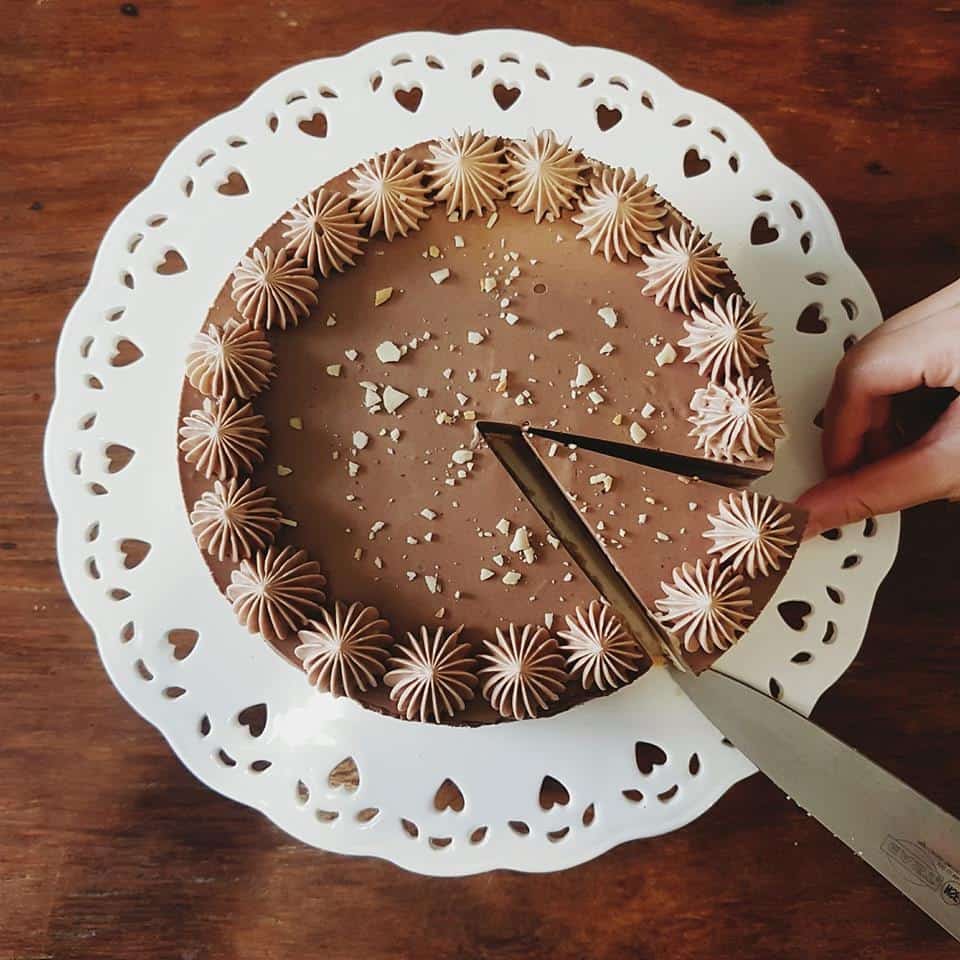 getting a slice of No-Bake Nutella Cheesecake