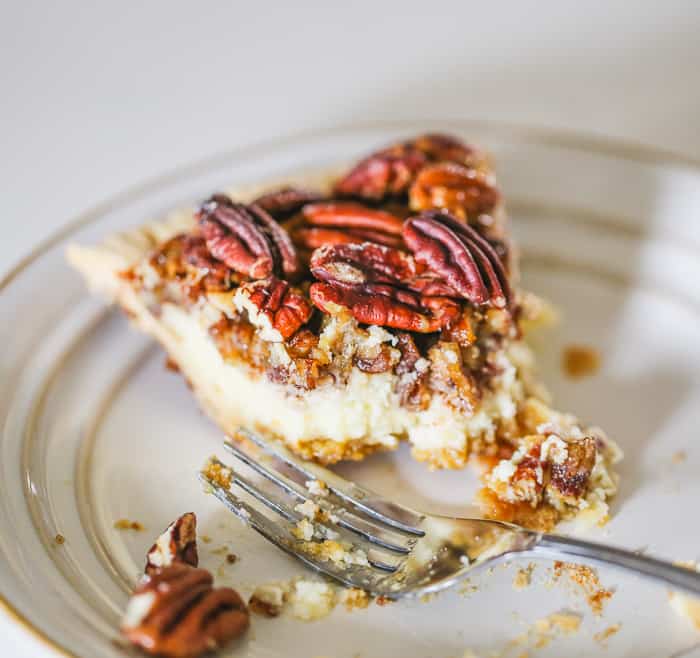 Pecan Cheesecake Pie with fork and bites gone!