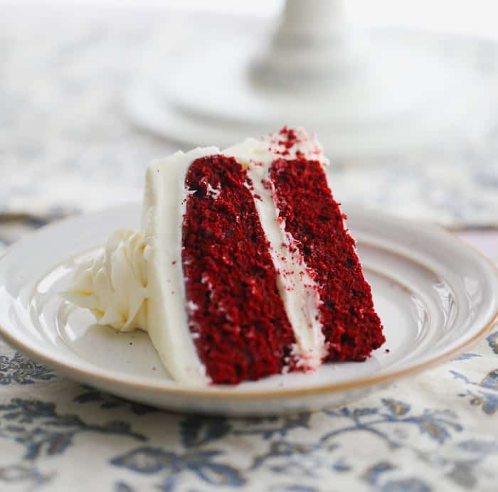 slice of red velvet cake recipe with cream cheese frosting