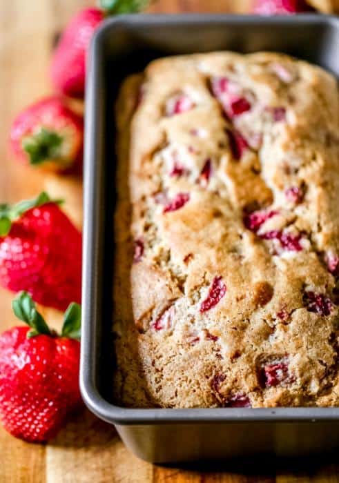 roasted strawberries are used in this healthy strawberry quick bread