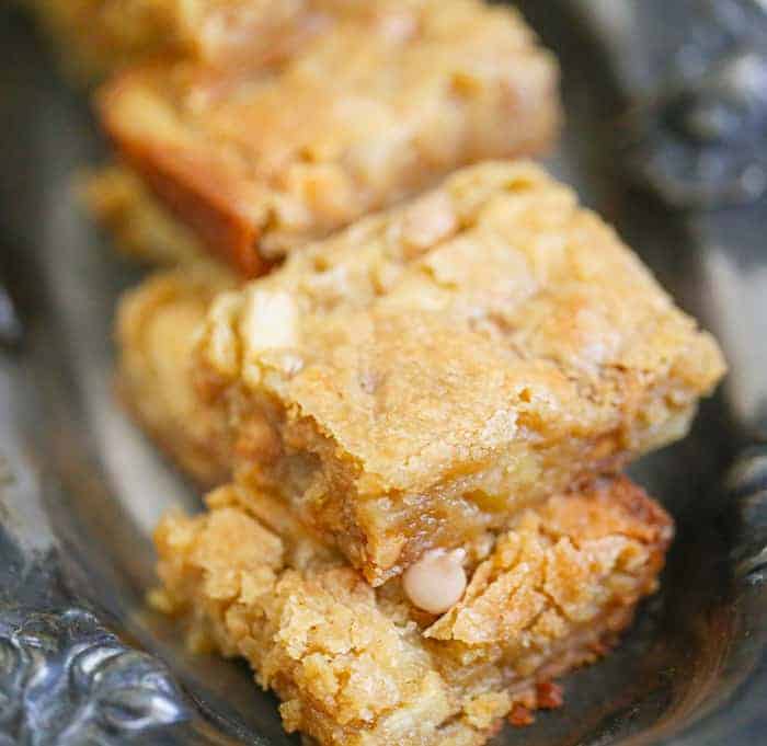 Salted Caramel Chip Apple Blondies bars on a tray