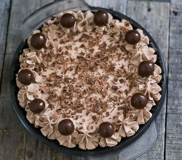 Ultimate Baileys Chocolate Cream Pie recipe with whipped chocolate and malted milk balls