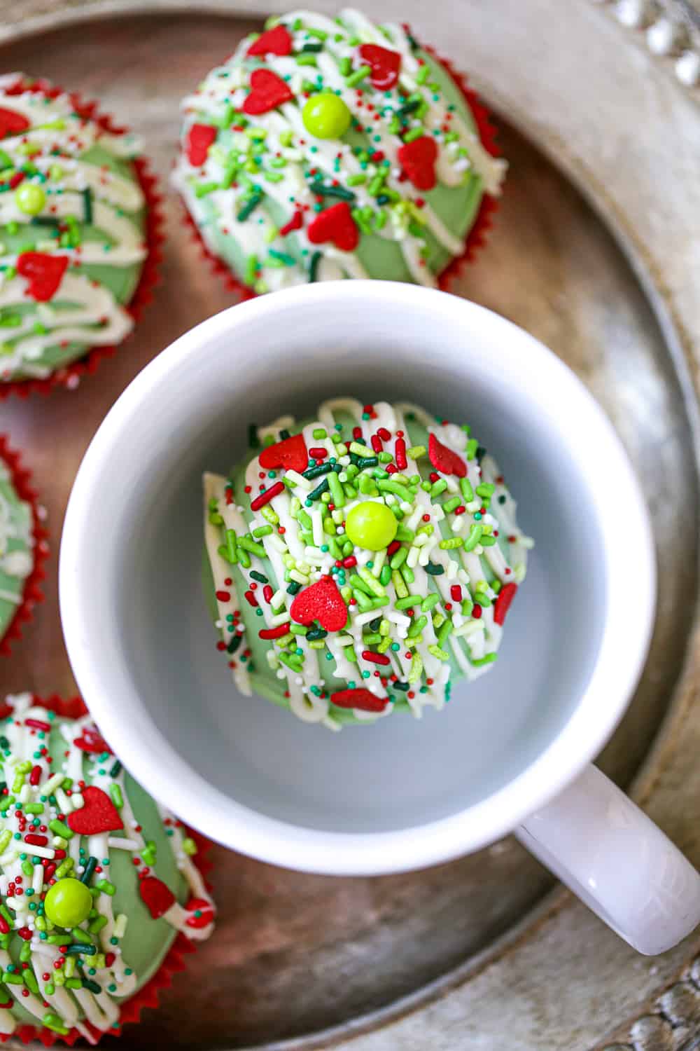 Grinch Cocoa Bombs in a cup