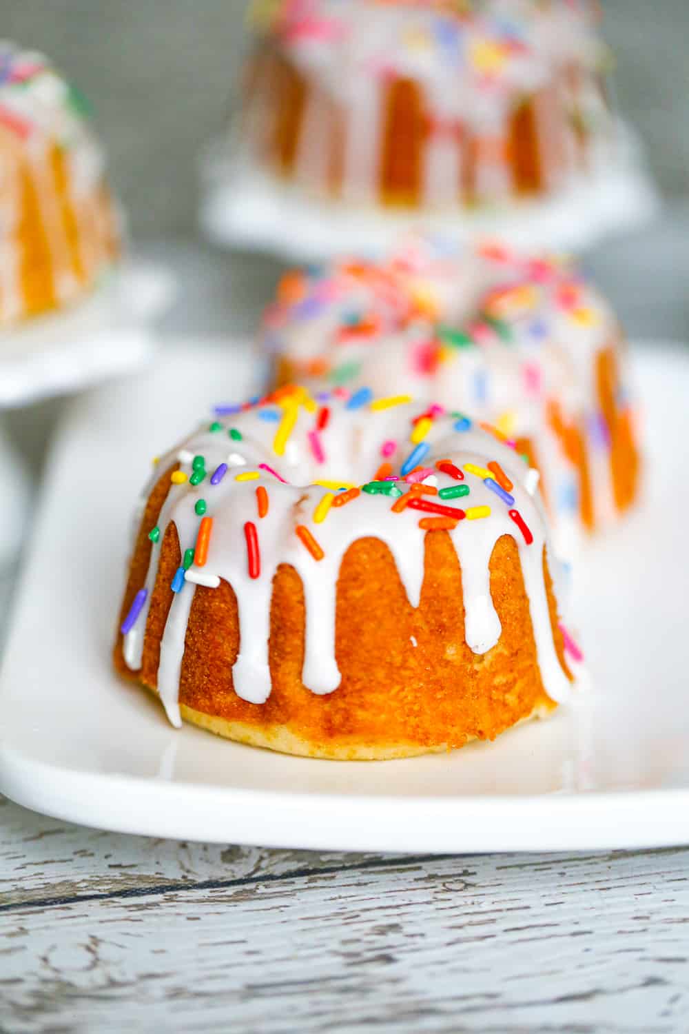 Vanilla White Bundt Cakes via The Baking ChocolaTess