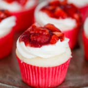 Strawberry Shortcake Cupcakes are vanilla cakes filled with light and fluffy whipped cream and finished with cream cheese frosting and fruity strawberry filling on top. 
