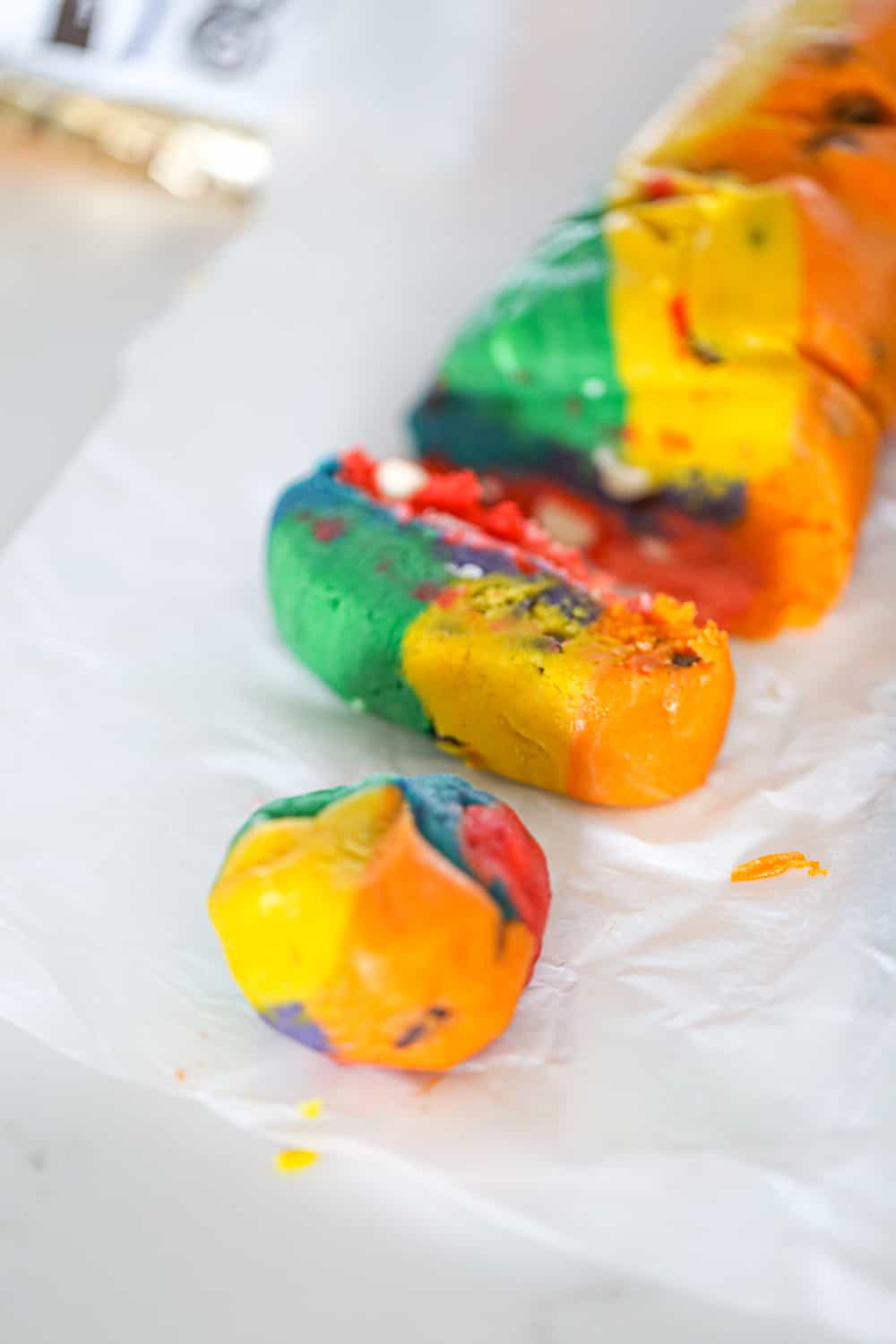 Rainbow Cookies slicing them into cookies