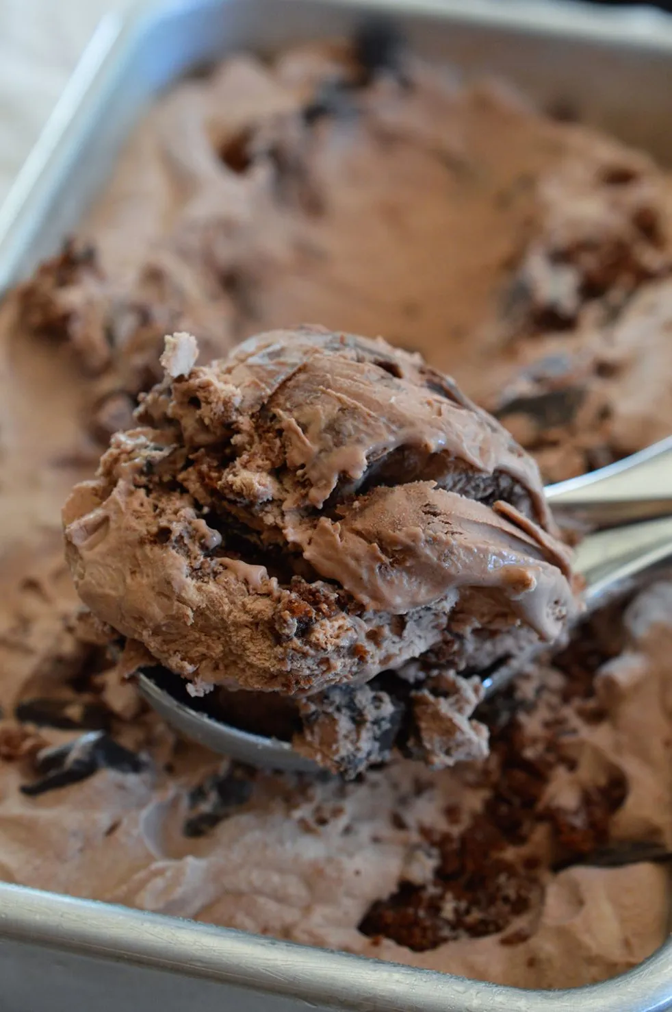 Extreme Chocolate Ice Cream is a must make recipe. This No Churn Ice Cream is packed with Chocolate Chunks and Brownies! Inspired by my favorite Dairy Queen Blizzard flavor. Death By Chocolate never tasted so good!