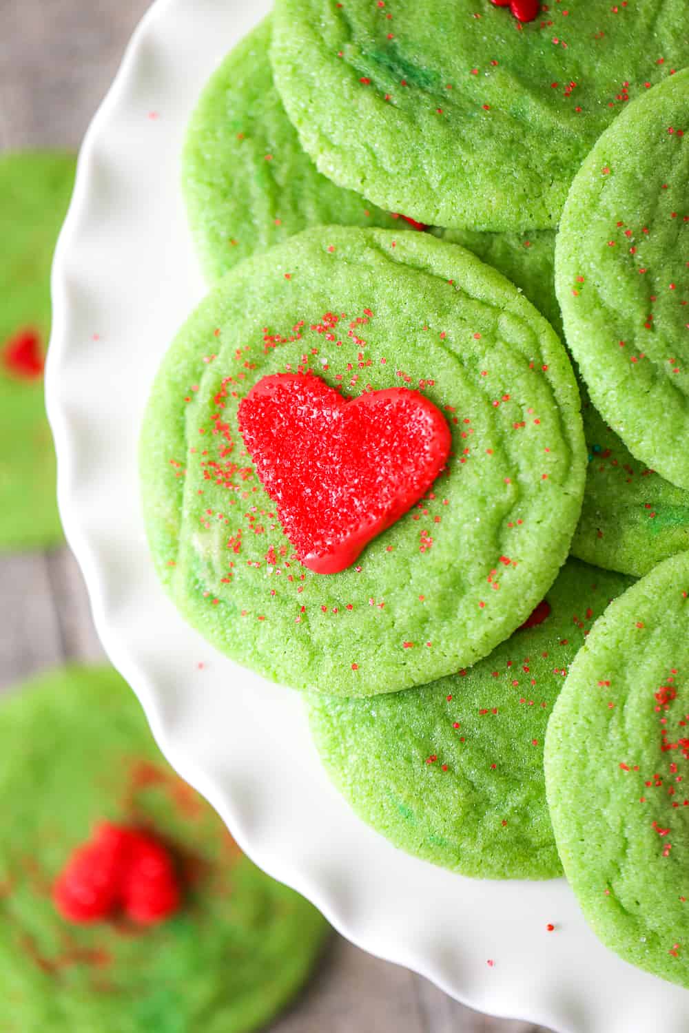 grinch christmas sugar cookies recipe with hearts in the middle