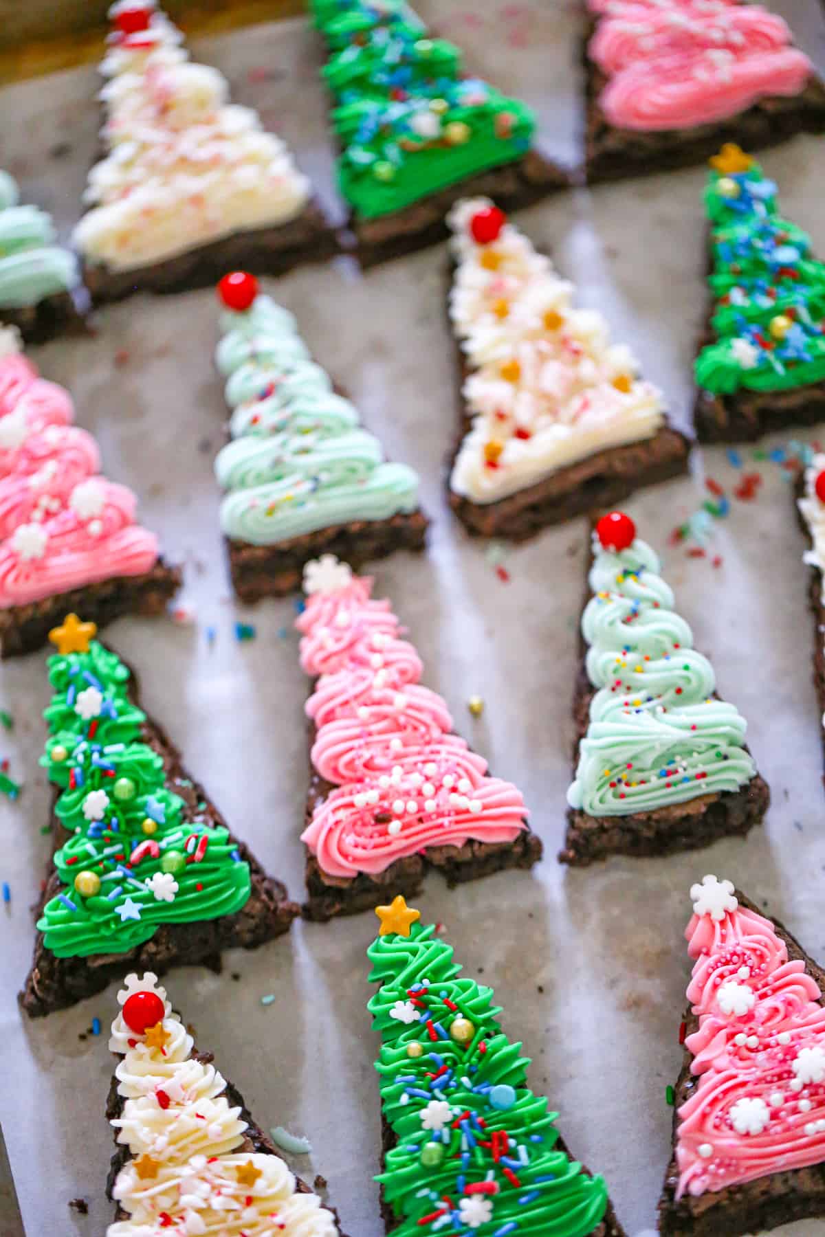 Easy Brownie Christmas Tree Treats recipe with frosting and sprinkles