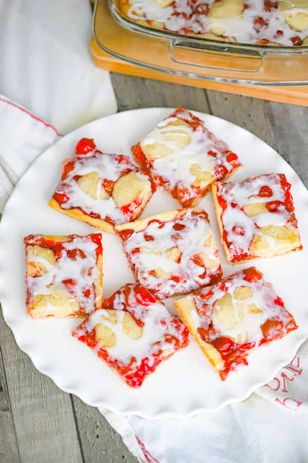 A plate of pizza with cherry pie filling.