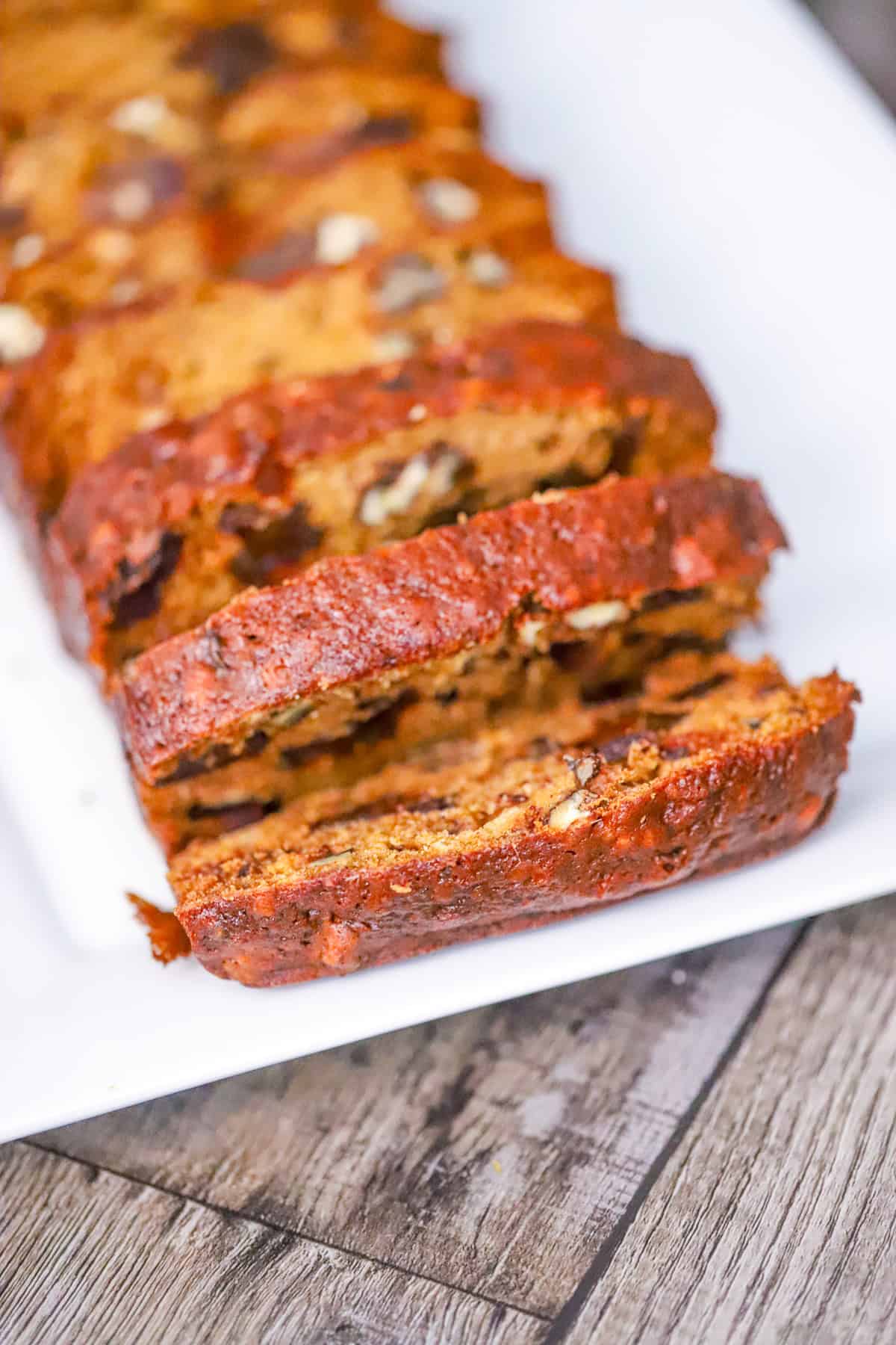 Sliced loaf of homemade date nut bread