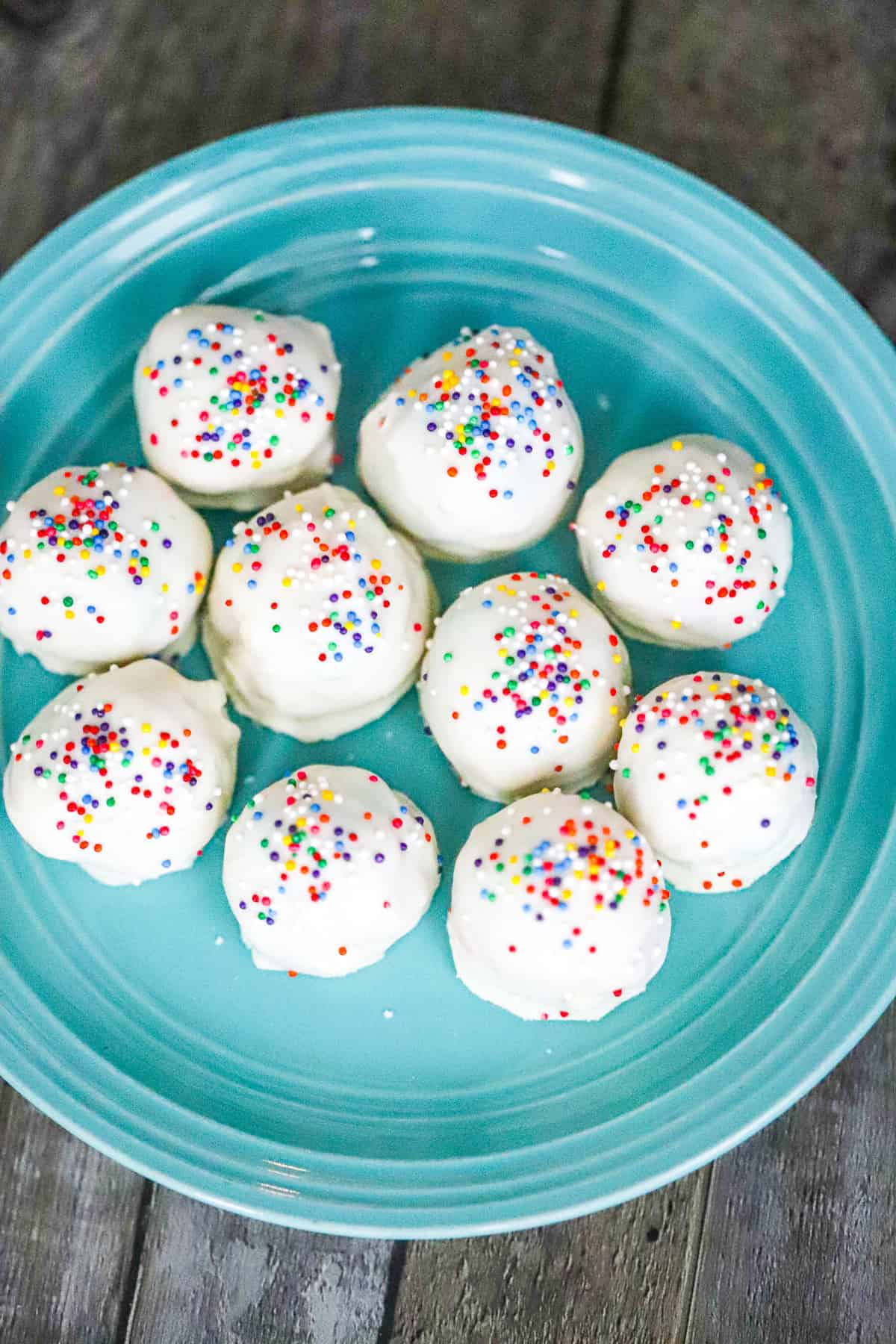 rolling m&m cookie dough truffles