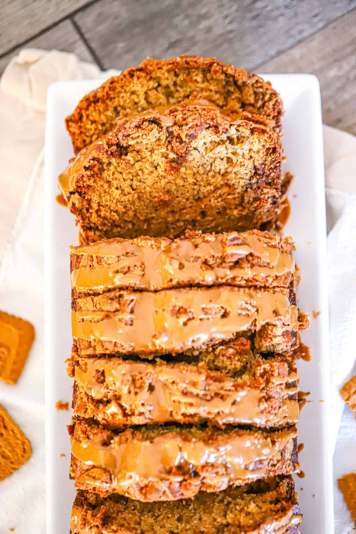 Biscoff spread being swirled into the batter with a knife