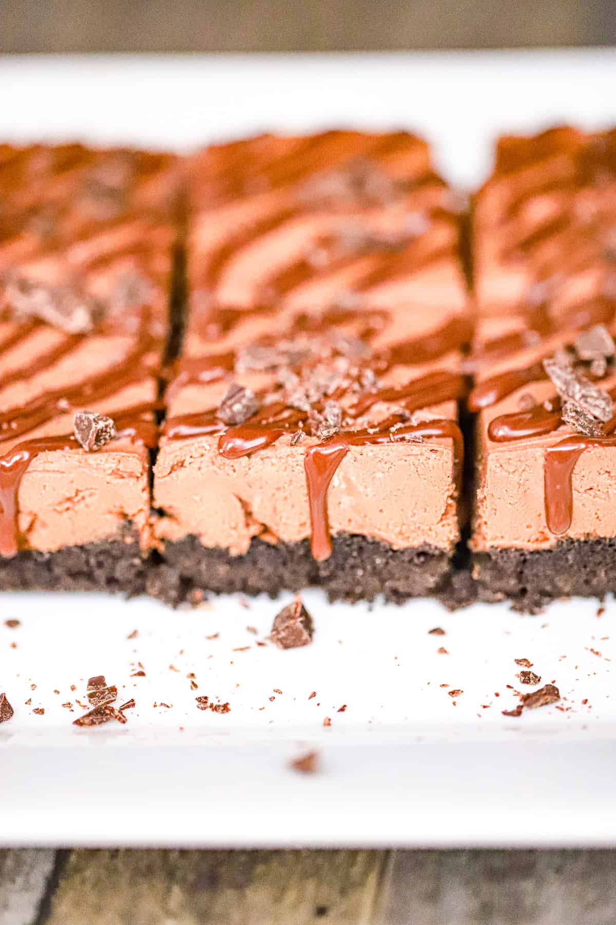 Creamy dark chocolate protein cheesecake filling being mixed in a bowl