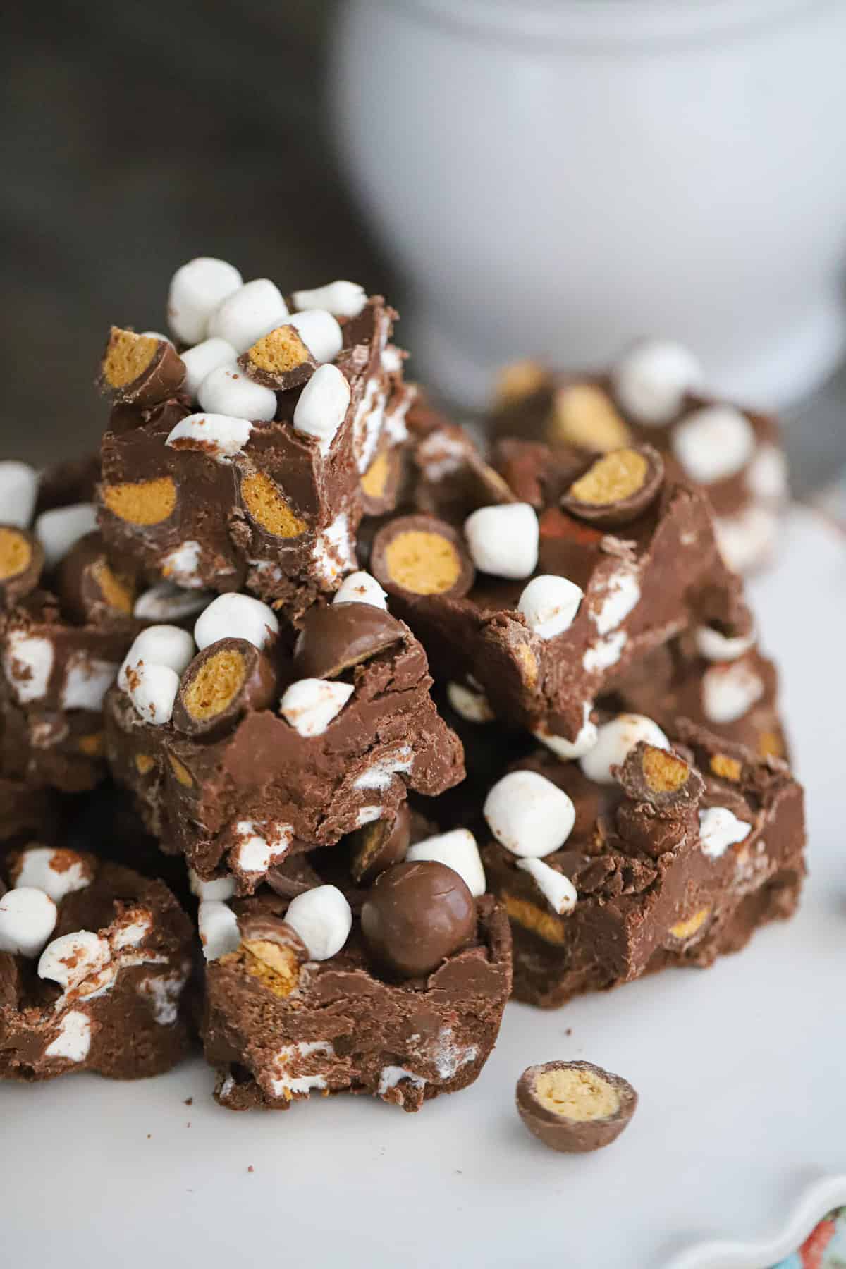 Rich creamy chocolate candy squares topped with crunchy candy pieces