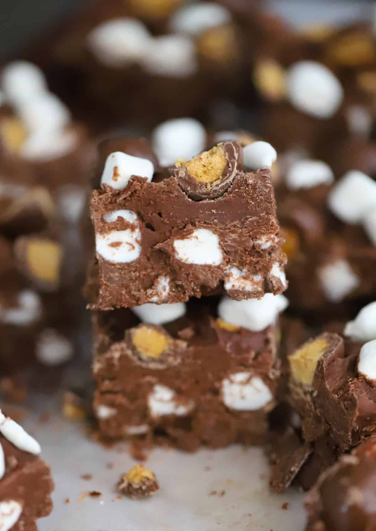 Chocolate fudge with marshmallows and malted milk balls close up