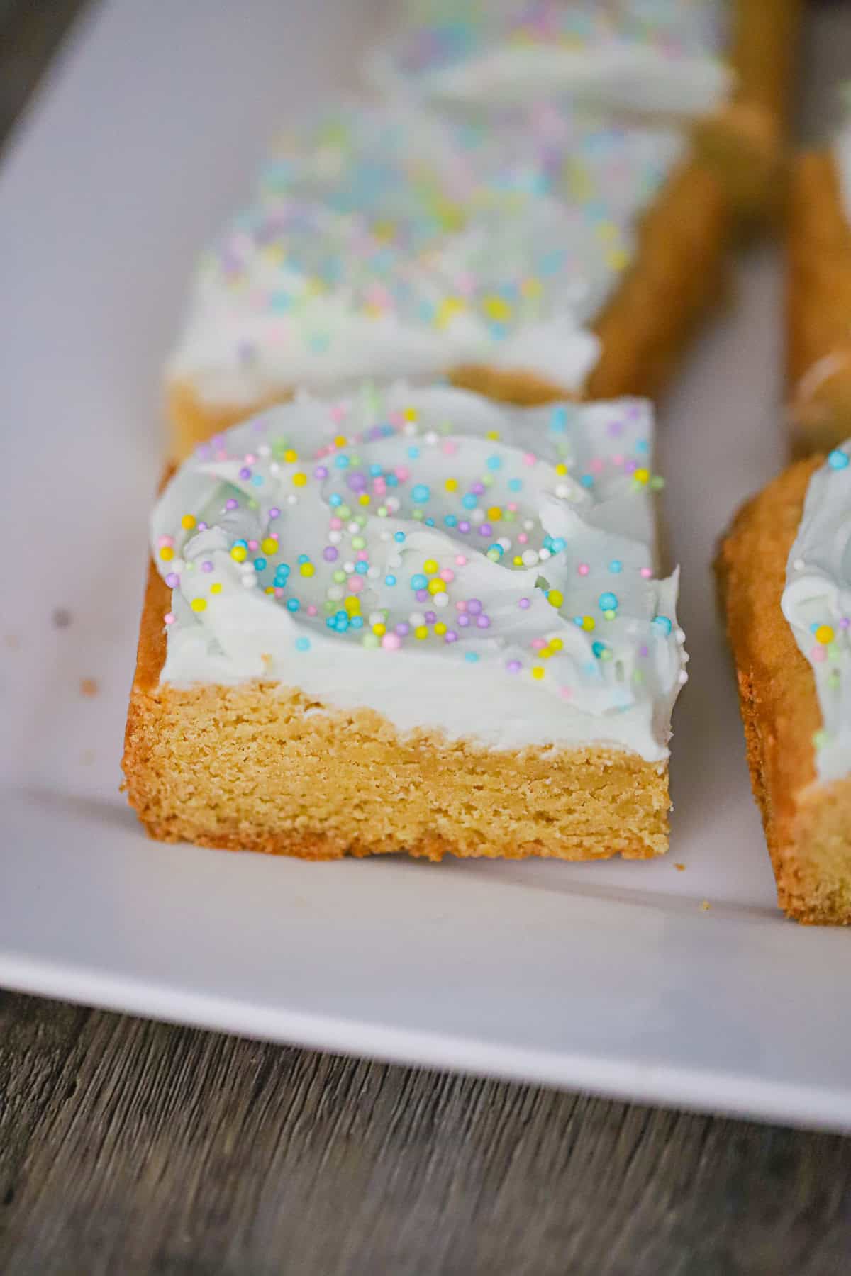 Spring sprinkle cookie bar dough pressed into baking pan