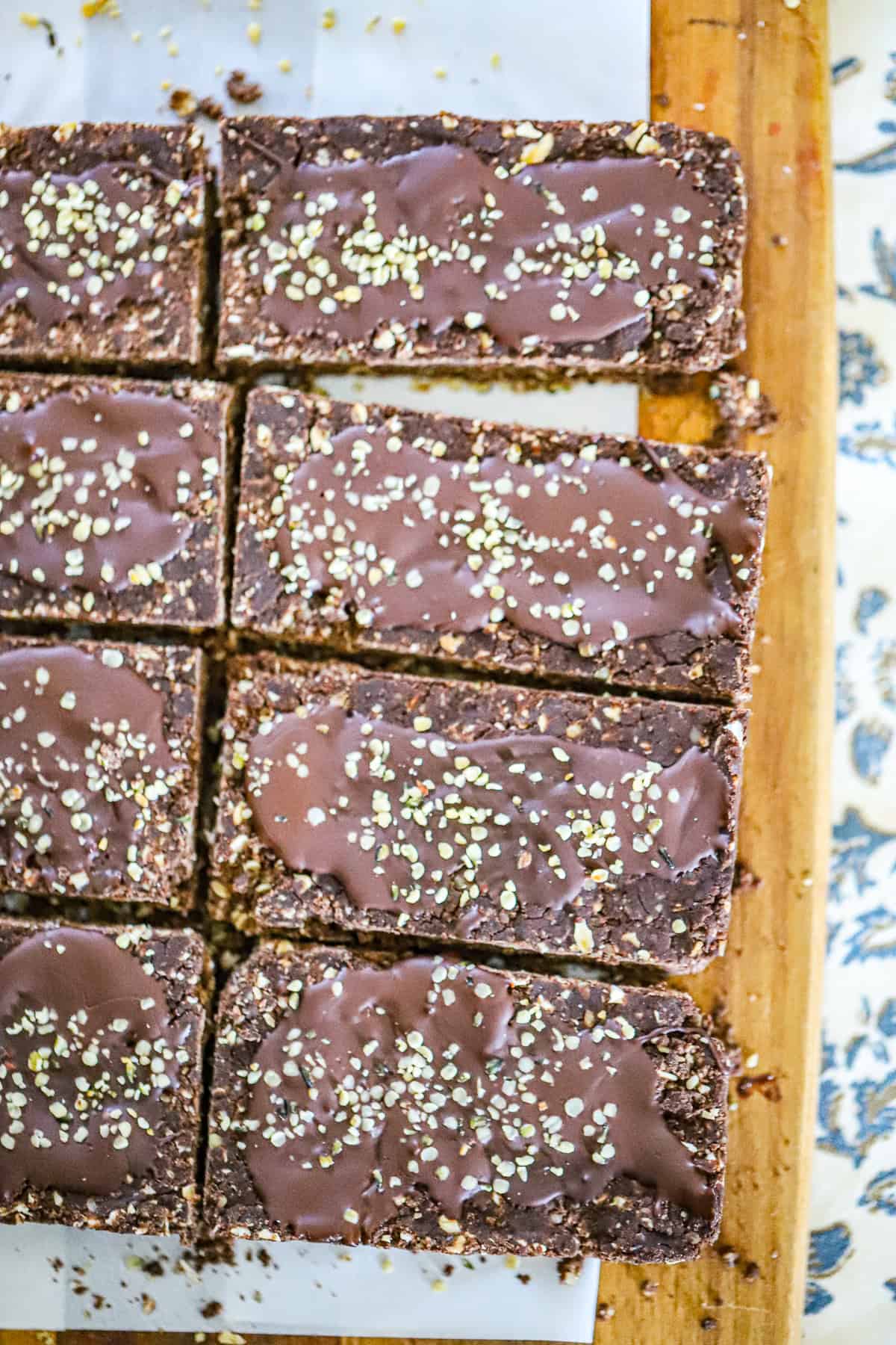 Close-up of sliced chocolate protein bars with hemp seeds on top