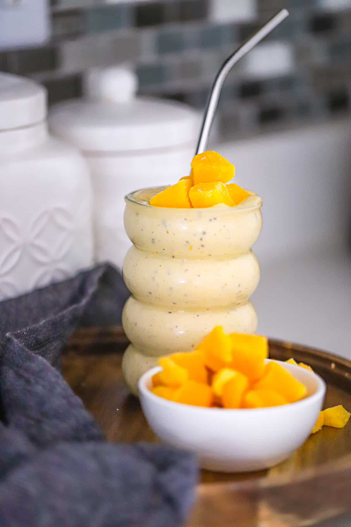 chai mango protein smoothie topped with chia seeds