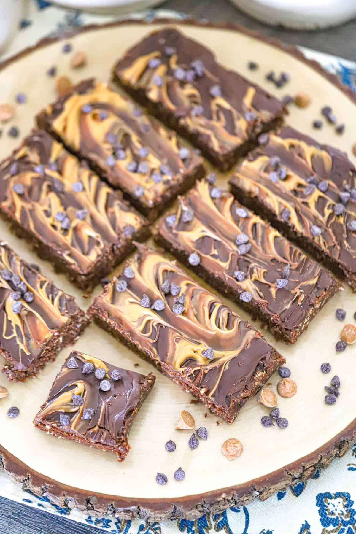 Thick fudgy chocolate protein bars sliced on a cutting board