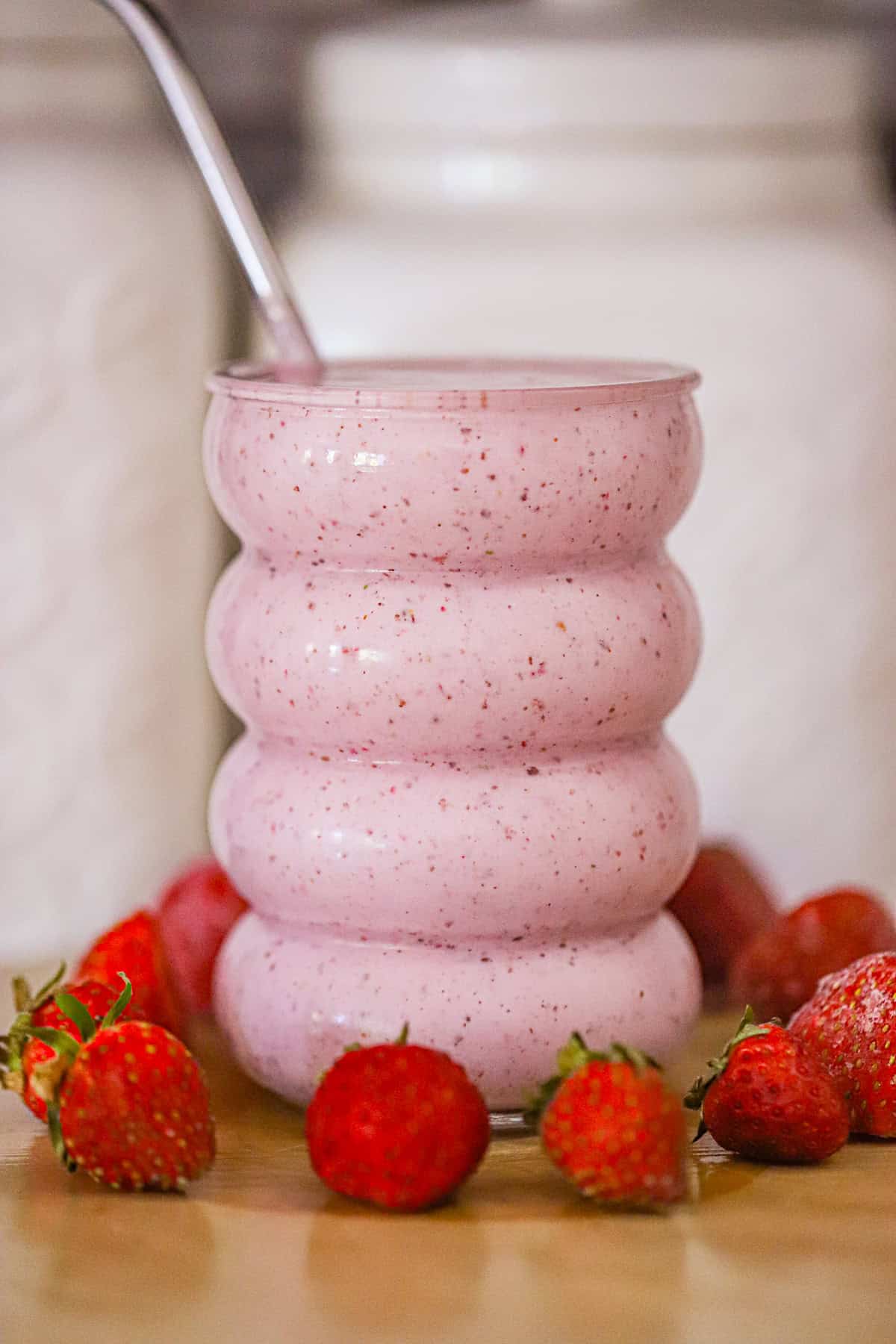 ingredients for a creamy strawberry vanilla yogurt smoothie