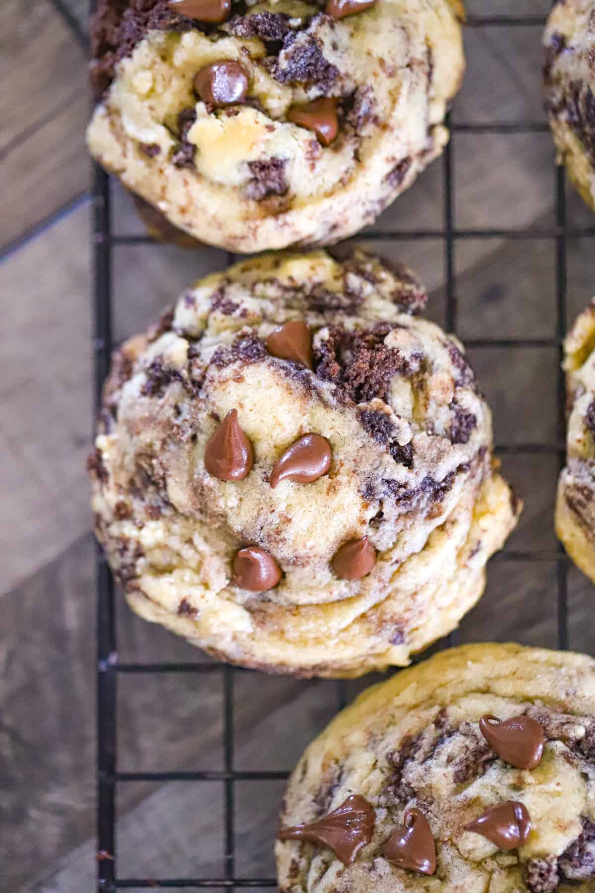 Chocolate chip topped cookies filled with thick pieces of dark brownie