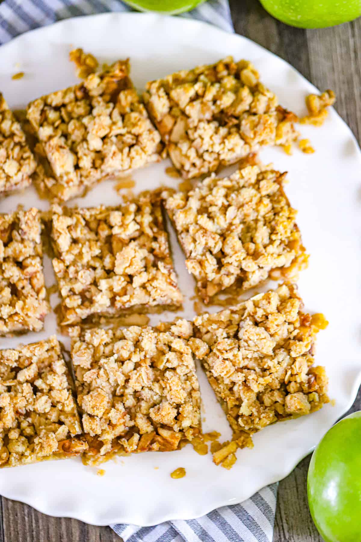 Apple crumble bars with a buttery oat topping and tender fruit center