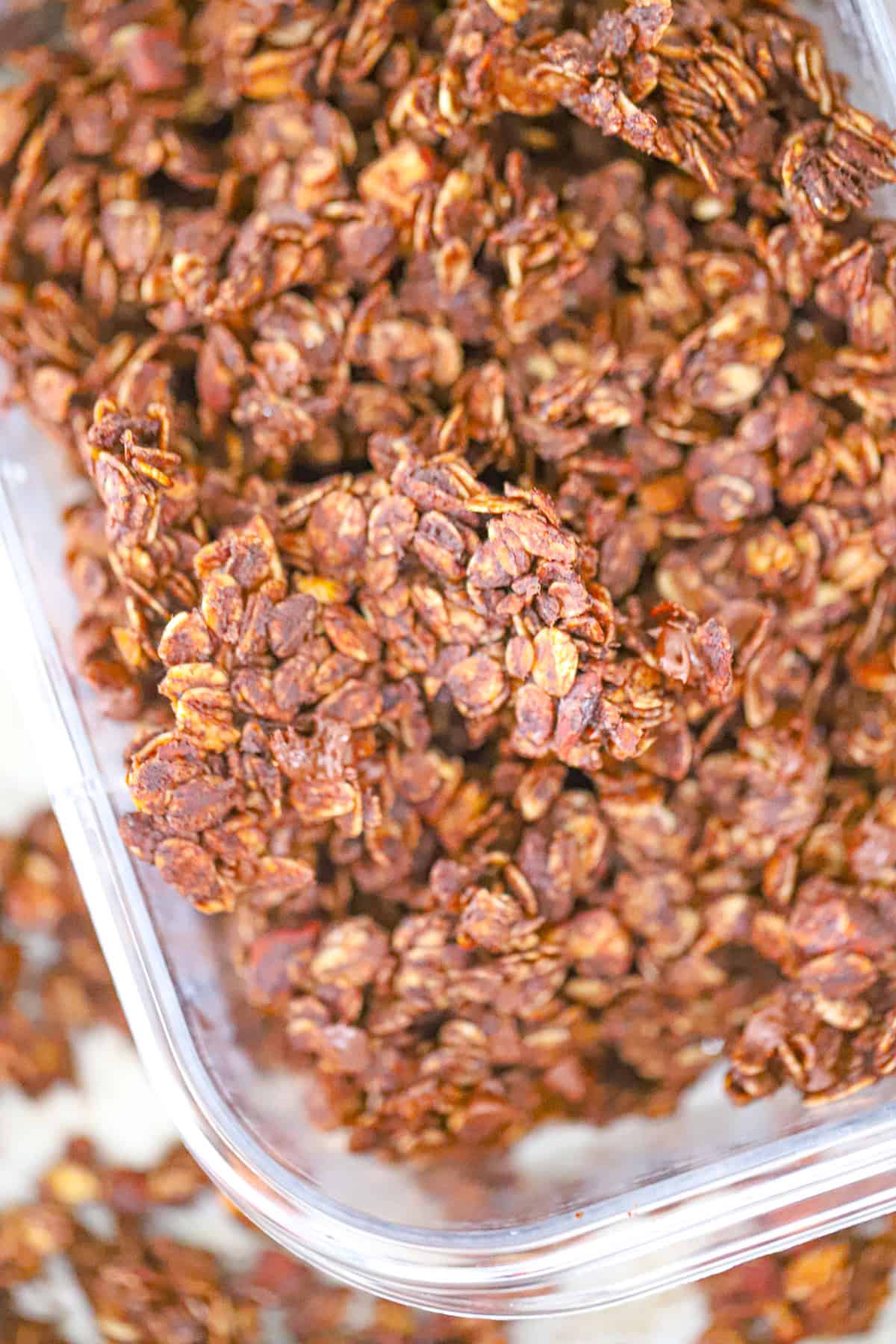 cocoa-coated oat mixture pressed firmly onto a parchment-lined sheet pan