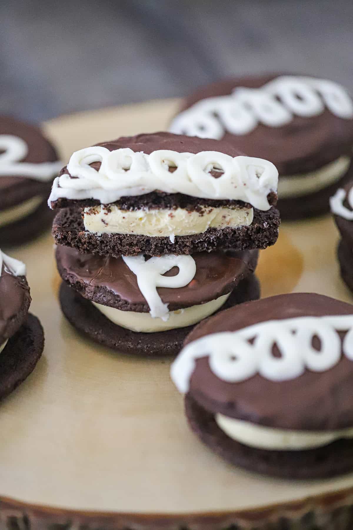 marshmallow cream filling piped onto dark cocoa cookie rounds