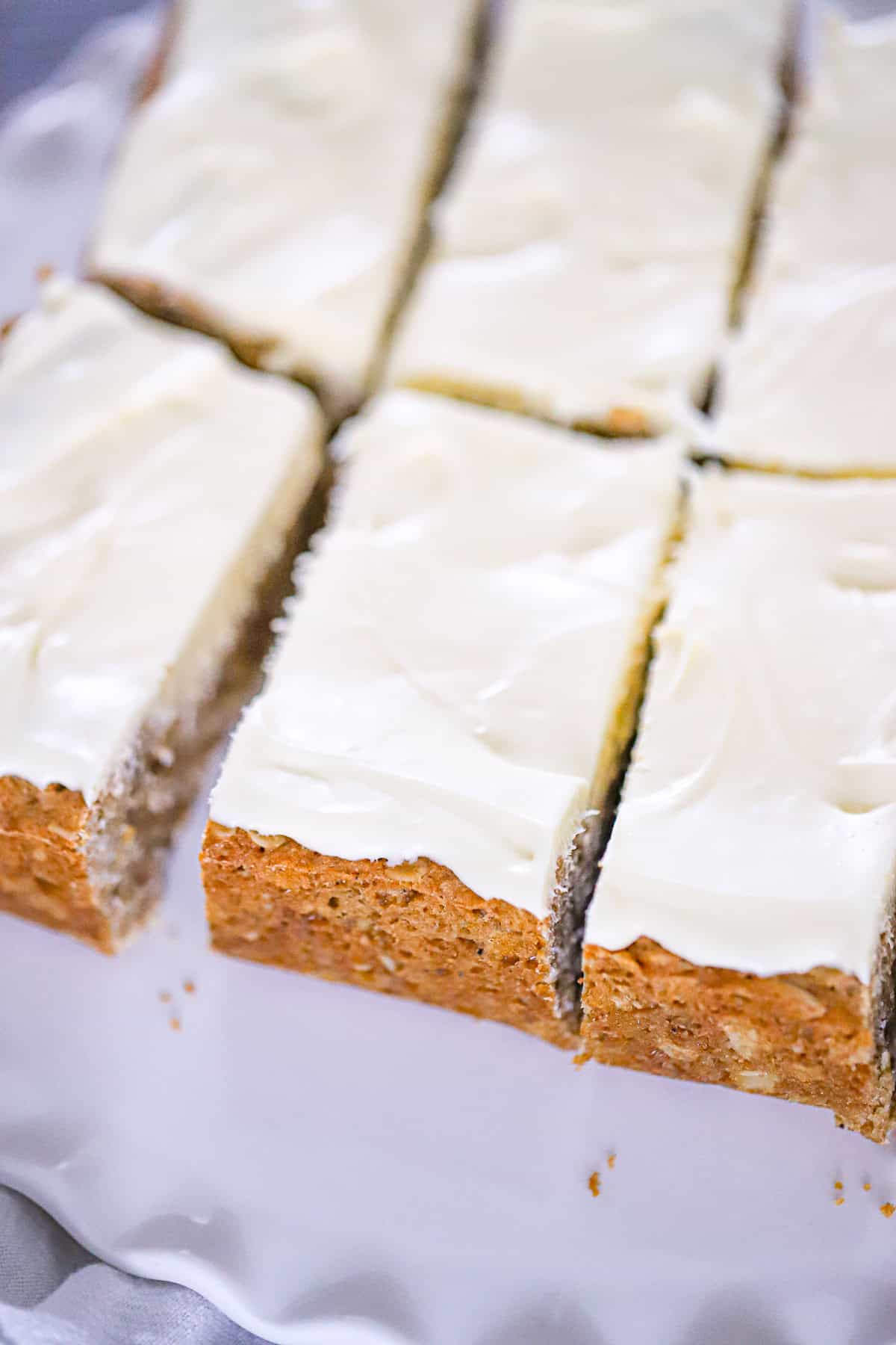 soft and chewy oatmeal creme pie bars stacked on a plate
