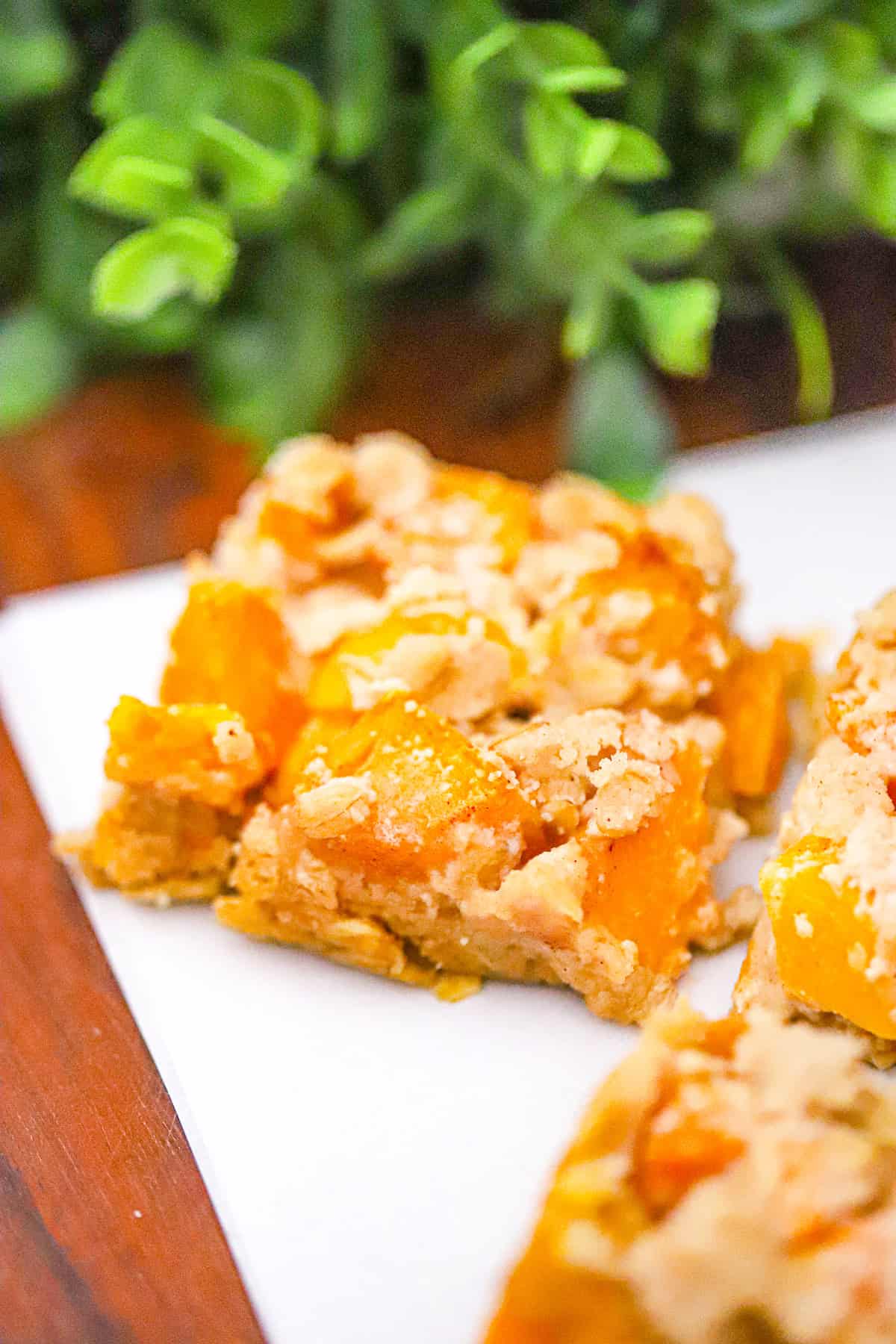 Peach Cobbler Cookie Bars baking with a crisp golden crumble topping