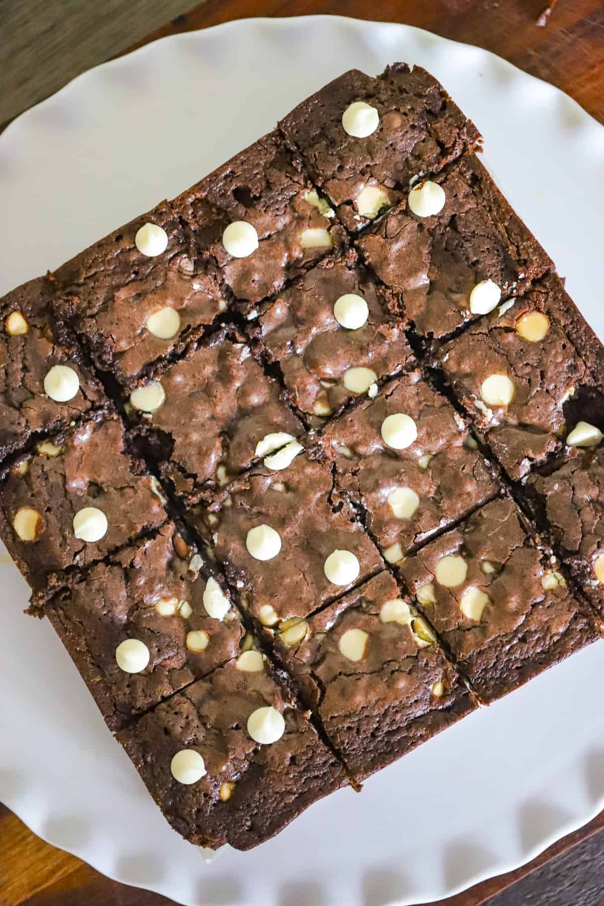 Melted white chocolate chips folded into thick brownie batter