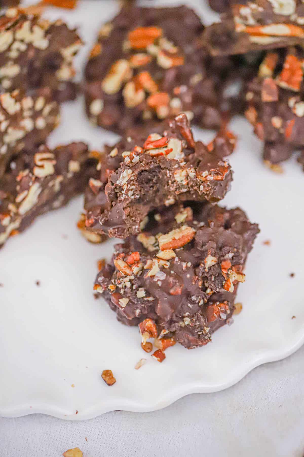 Brownie pecan clusters coated in dark chocolate and topped with crunchy pecans - leftover brownie dessert
