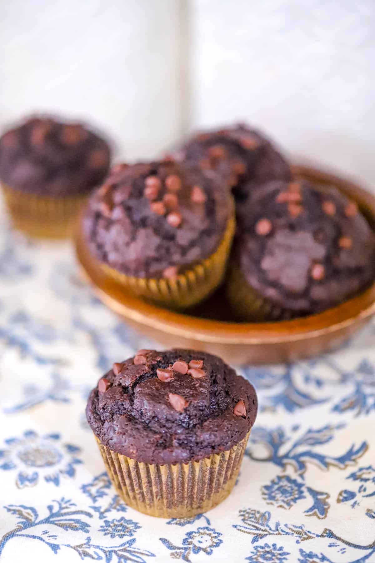 Chocolate chai muffin showing its tender cocoa crumb