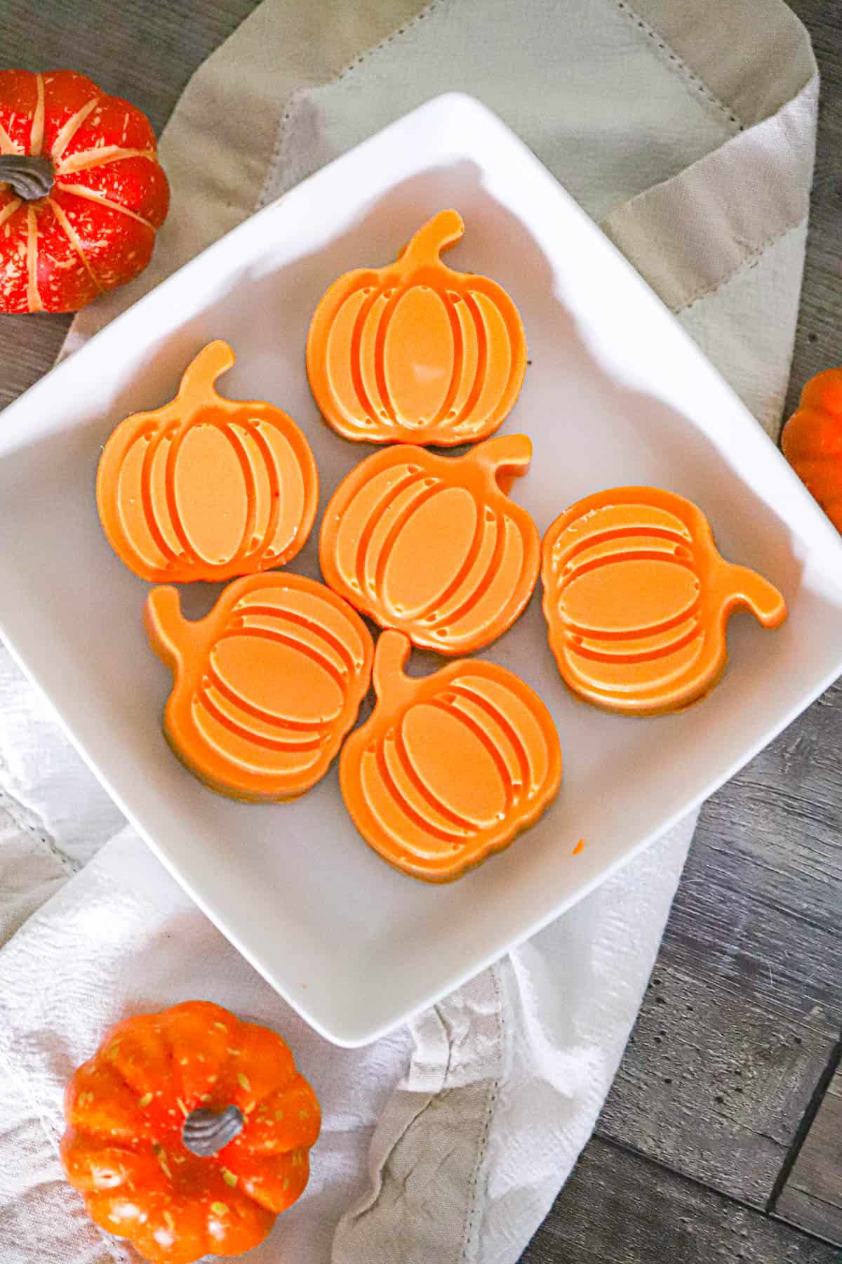 Cut orange candy revealing a creamy peanut butter center