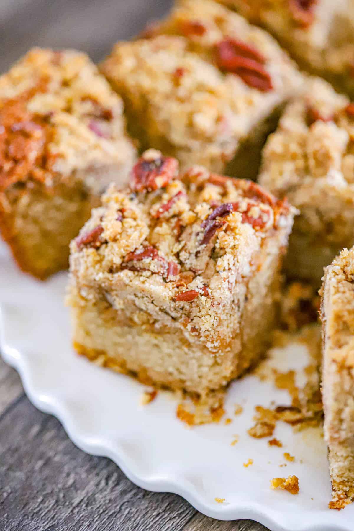 Warm coffee cake slice on a serving plate